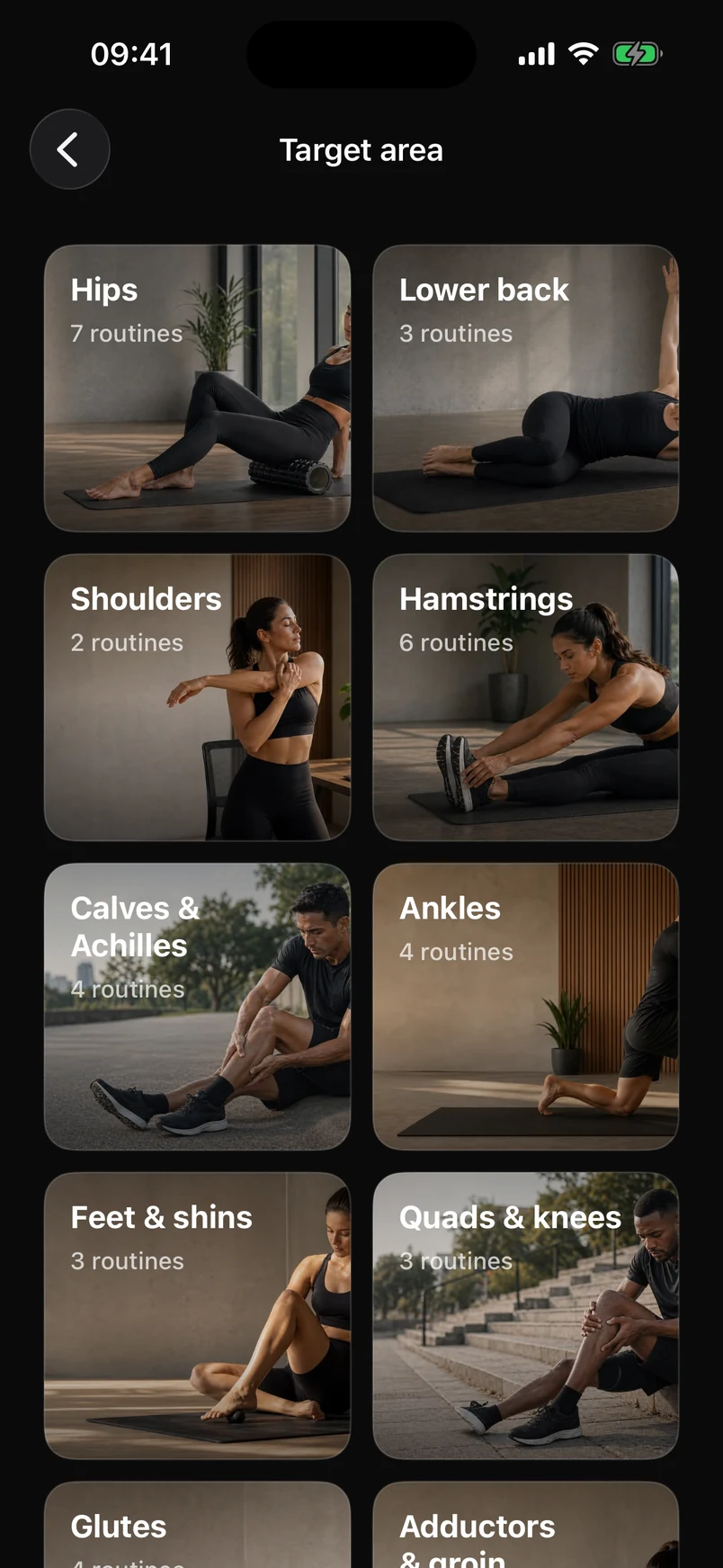 The Target area screen in dark mode, with photo tiles for hips, lower back, shoulders and more.