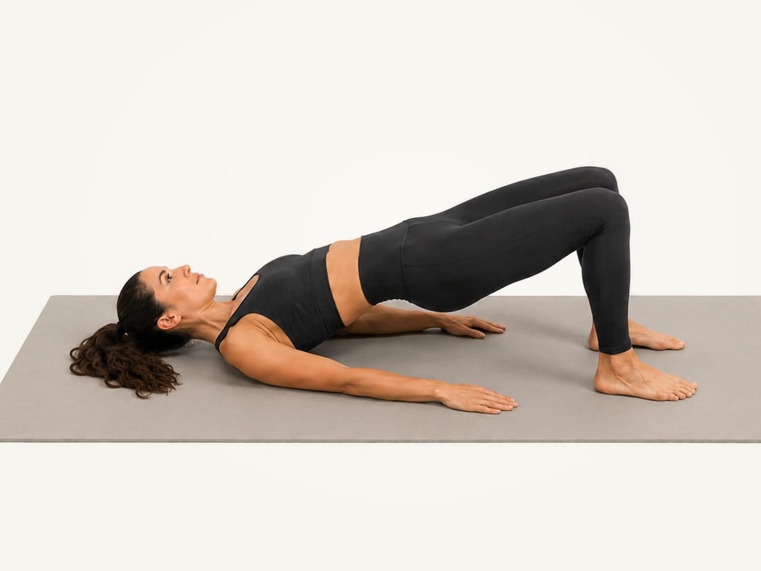 Step 2 of the glute bridge: hips lifted into a straight line from the shoulders to the knees