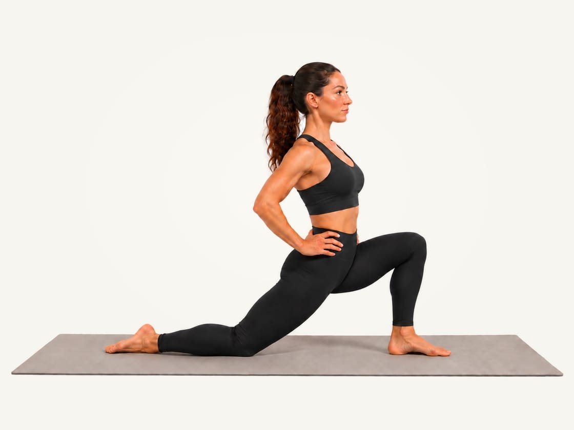 Kneeling hip flexor stretch: half-kneeling on the right knee, hands on the hips, hips shifted forward