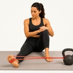 Banded ankle eversion: sitting with a resistance band around one foot, turning the foot outward