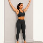 Wall slides: standing with the back against a wall, arms raised in a Y