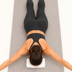 Y-T-W raises: lying face down with the forehead on a towel, arms lifted out to the sides